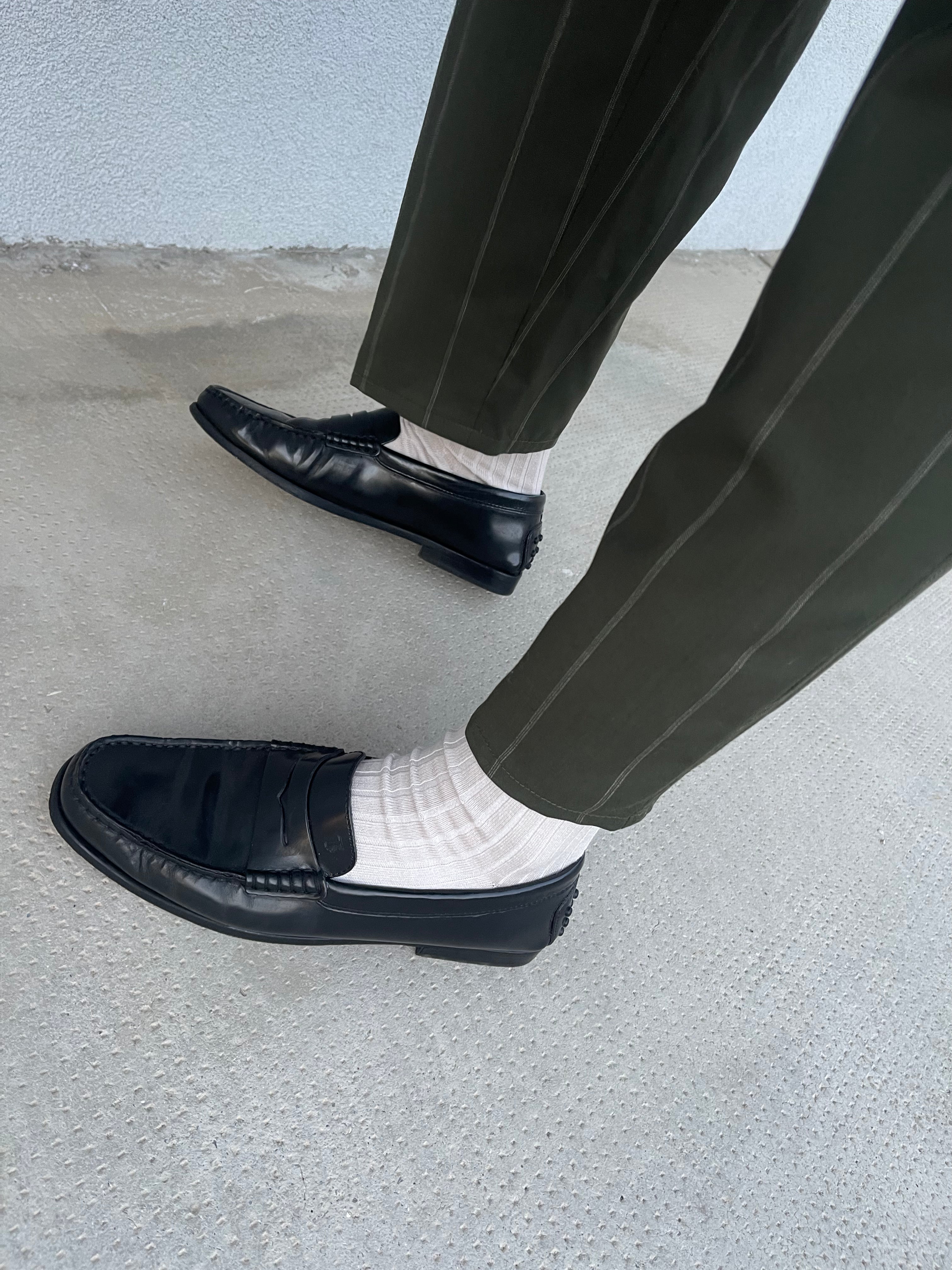 Tod’s black loafers